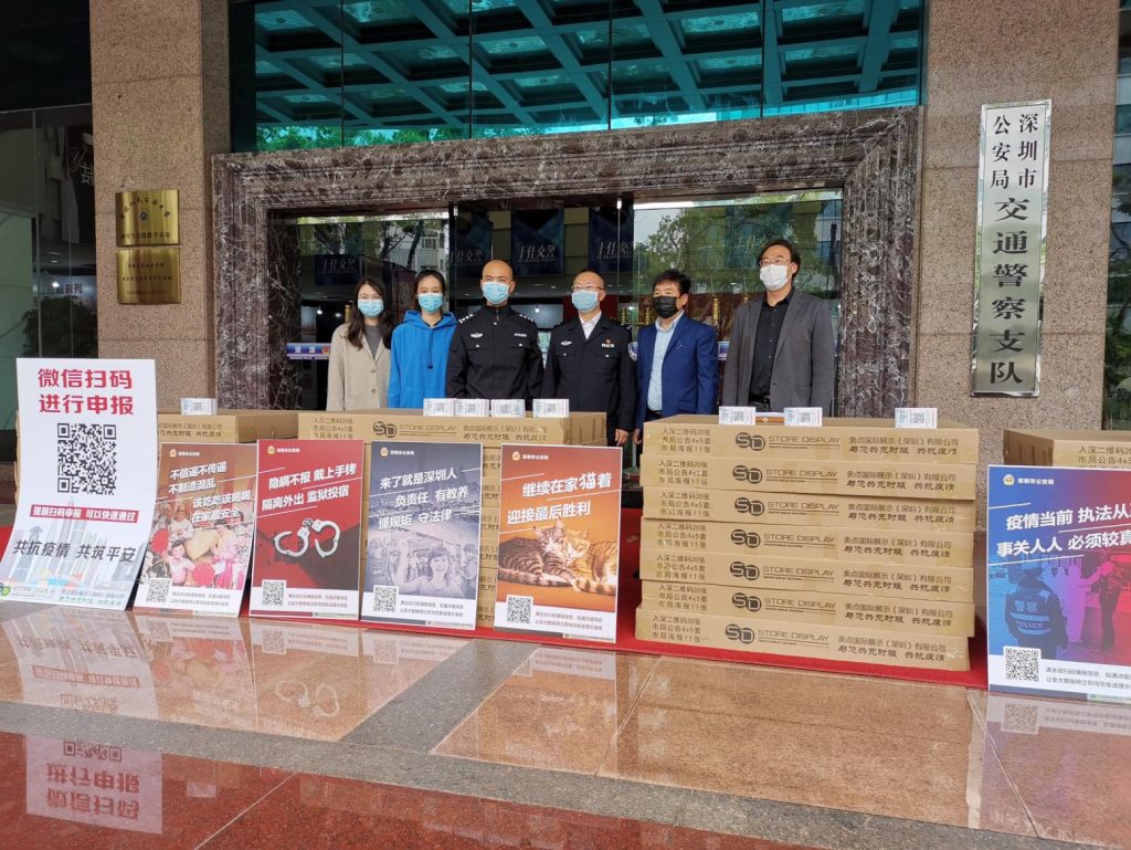 Store Display Group team organizing the distribution of pandemic prevention materials to quarantine checkpoints and local businesses.