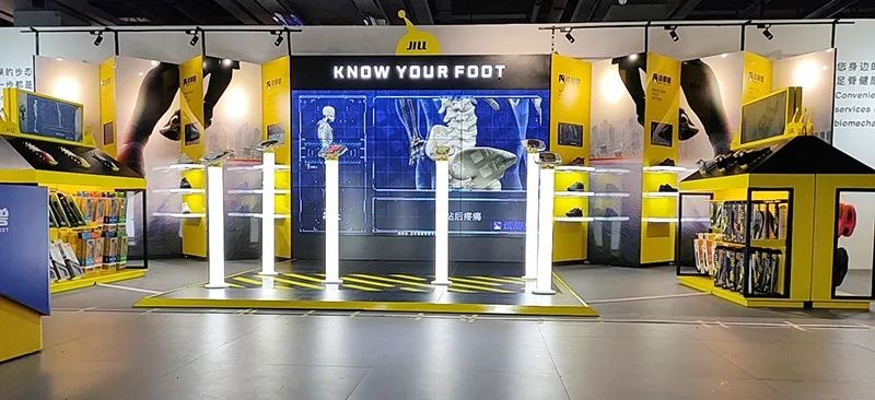 Exterior view of Footmagic’s intelligent shoe shop featuring SD’s interactive display solutions.