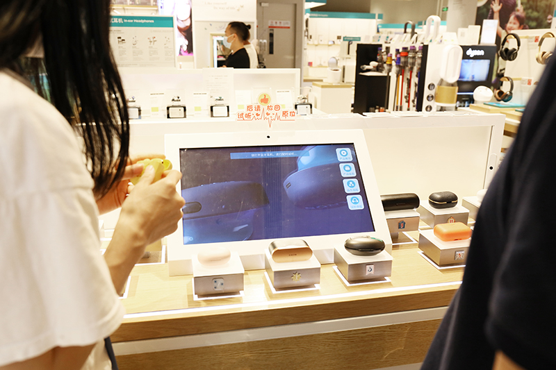 Intelligent display system with built-in security features, triggering alarms when products are moved too far from the display counter.