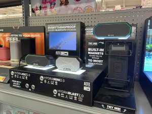 Smart audio product experience zone with interactive display in electronics retail store
